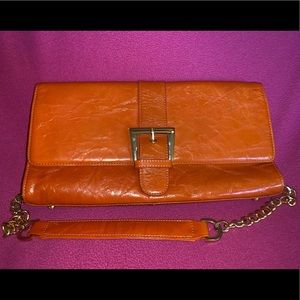 Orange clutch/ shoulder  bag by The Find